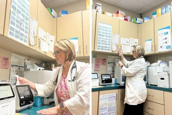A female veterinarian works in a laboratory to run diagnostic test.
